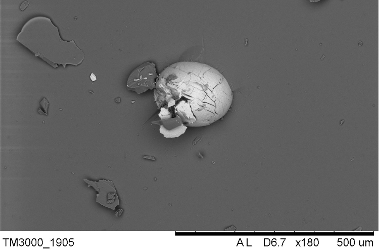 Spontaneous failure nickel Sulphide particle as viewed at x500 magnification